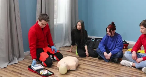 Student in first aid class exercising reanimation on dummy. First aid reanima Stock-Footage 152466580