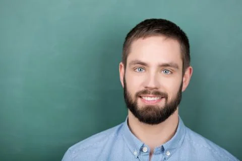 Student in front of a chalkboard Stock Photos