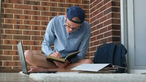 A student is fussily preparing for a session at the university Video stock 201614900