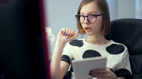 Student girl. Distance Learning. science or lessons listening on the Internet  Stock Footage 128311205
