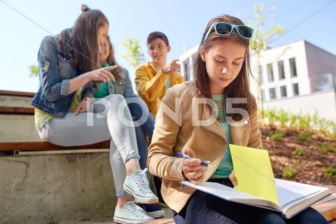 Student girl suffering of classmates mockery Stock Photos