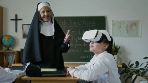 Student Girl in VR Headset Sharing Emotions with Teacher in Religious School Stock Footage 311809498