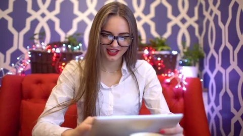 Student in glasses using tablet computer for on line purchase with credit card Stock Footage 85367318