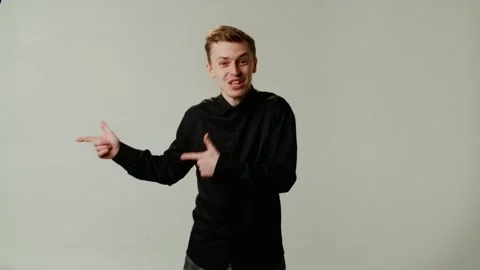 A student guy chooses a suitable classmate as the host of entertainment event Stock Footage 253035896