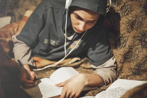 Student guy studying at home Stock Photos