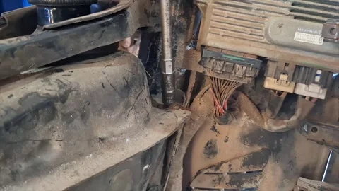 Student Hand Practicing Motorcycle Engine Wiring Maintenance in Workshop Stock Footage 319607080