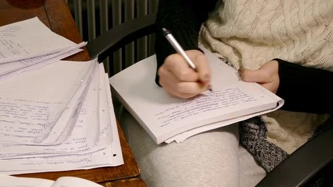 A student hand writing assignment notes. Video stock 71264329