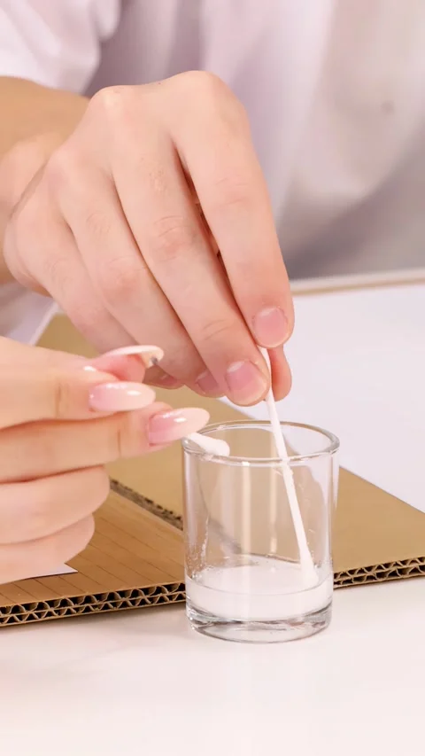 Student Hands Dipping Cotton Swabs into Beaker for Science Experiment Stock-Footage 345015261