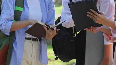 Student hands exchanging knowledge. Student hands collaborate. Stock Footage 310679336