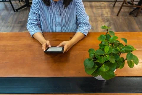 Student hands holding tablet while reading electronic book Stock Photos
