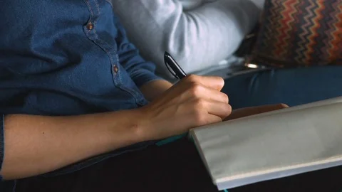 Student hands making notes Stock Footage 69812145