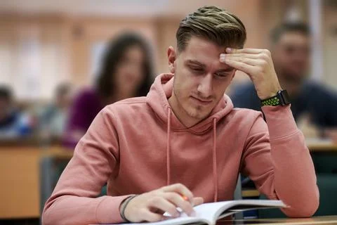 The student has a headache in class Foto stock