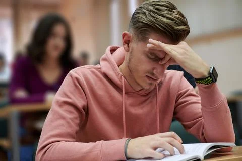 The student has a headache in class Foto stock