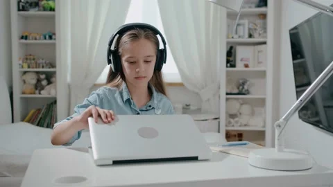 Student in headphone open laptop study online with internet teacher learn Stock Footage 133165320