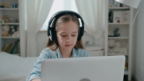 Student in headphone study online with internet teacher learn looking at laptop Stock Footage 133165452