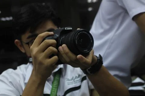 Student Holding a Camera Stock Photos