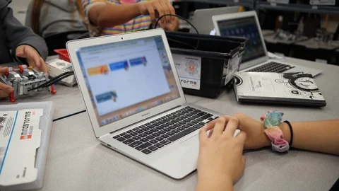 Student On Laptop Scrolling Down Through Classwork Webpage Stock Footage 126483340