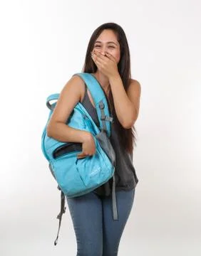Student Laughing and Reaching for Backpack Stock-Fotos