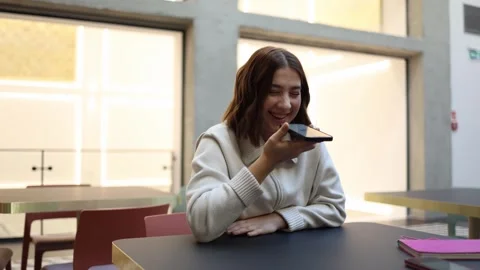 Student laughs and chats casually with artificial intelligence Stock Footage 323738623