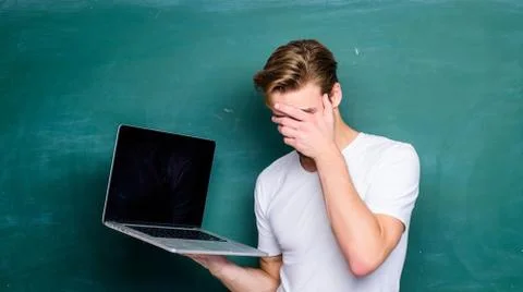 Student learn programming language. Handsome man use modern technology. Digital Stock Photos