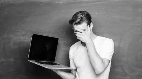 Student learn programming language. Handsome man use modern technology. Digital Foto stock