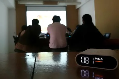 Student learning in bad environment. pm2.5 detector found large amount of par Stock Photos