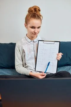 Student learning online, watching lesson remotely, listening to professor, ta Stock Photos