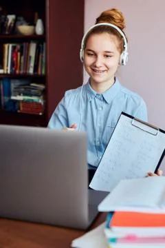 Student learning online, watching lesson remotely, listening to professor, ta Stock Photos