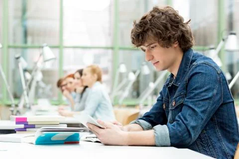 Student learning in a university library Stock Photos
