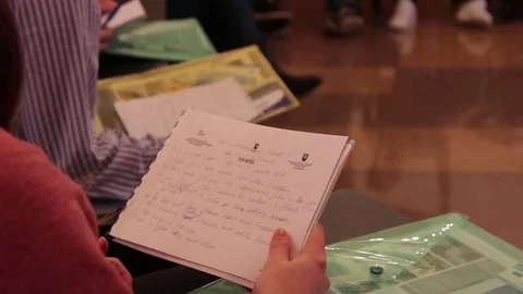 Student on the lecture with notebook Stock Footage 76037069