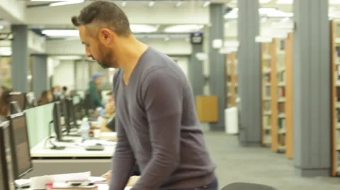 Student in a library 2 Stock Footage 34993984