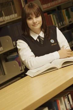 Student In A Library Foto stock