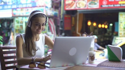 Student Listening To Music On The Computer While Studying Stock Footage 70722503