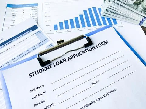 Student loan application form document on table Stock Photos