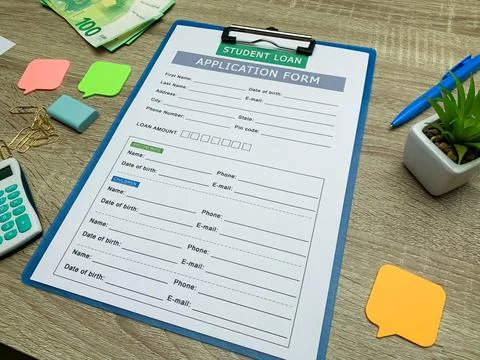 Student loan application form document on table Stock Photos