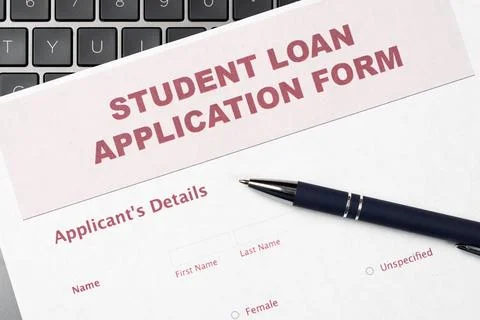 Student Loan Application Form on Laptop Keyboard Stock Photos
