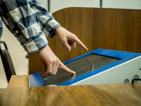 Student making presentation interactive touch display in university Foto stock