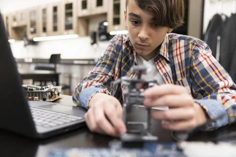 Student making robot in IT class Stock Photos