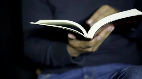 Student Man Reading A Book, Turning The Pages And Searching For Information Stock Footage 272476876
