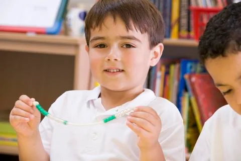 Student in math class with counting beads Stock Photos