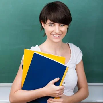 Student with note books Foto stock