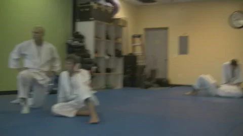 STUDENT OBSERVES JIU JITSU INSTRUCTOR Stock Footage 285661
