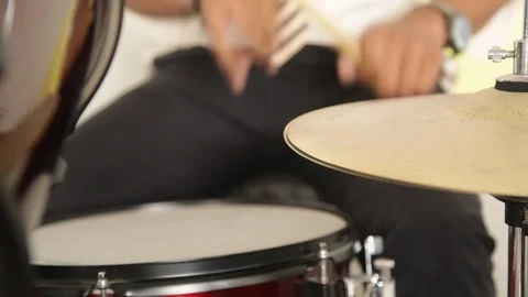 A student or drummer playing Bass Drum in a school concert. Stock Footage 112965786