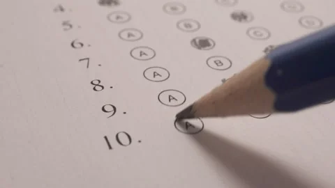 Student With Pencil Doing A Multiple Choice Test. Filling Out Bubbles. Stock Footage 172586221