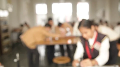 A student is performing science experiments in school lab. Stock-Footage 114479764