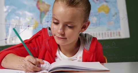 Student picking green pencil, writing algebra notes while graphs and formulas Video stock 312281014