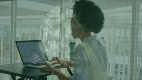 Student placing hands on laptop, typing, using trackpad at window, overlay Stock Footage 334115703