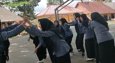 Student Playing Dragon Snake Video stock 219371379