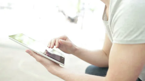 Student playing with electronic device, close-up, side view Stock Footage 39343234