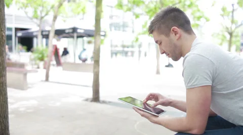 Student playing with electronic device, medium shot Stock Footage 39343235